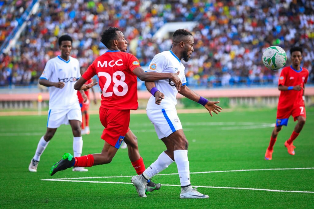 Soccer players competing fiercely during a match in Mogadishu, Somalia.